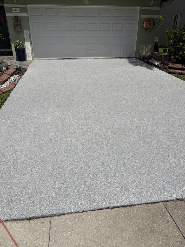 Finished light grey flake driveway coating