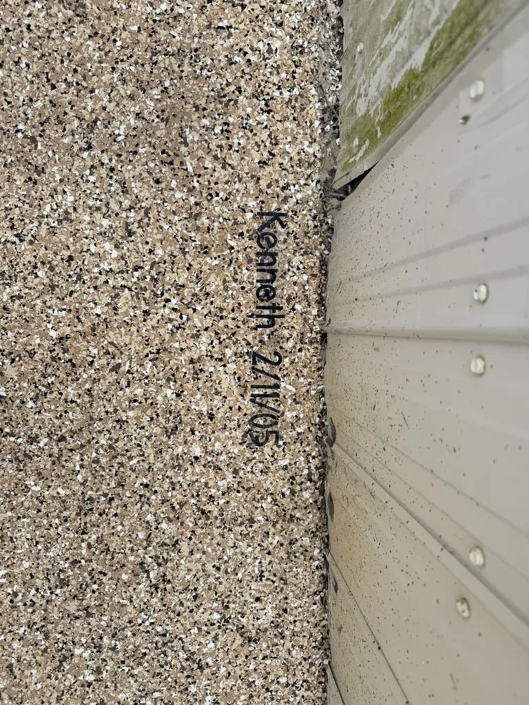 Finished tan flake epoxy driveway and walkway