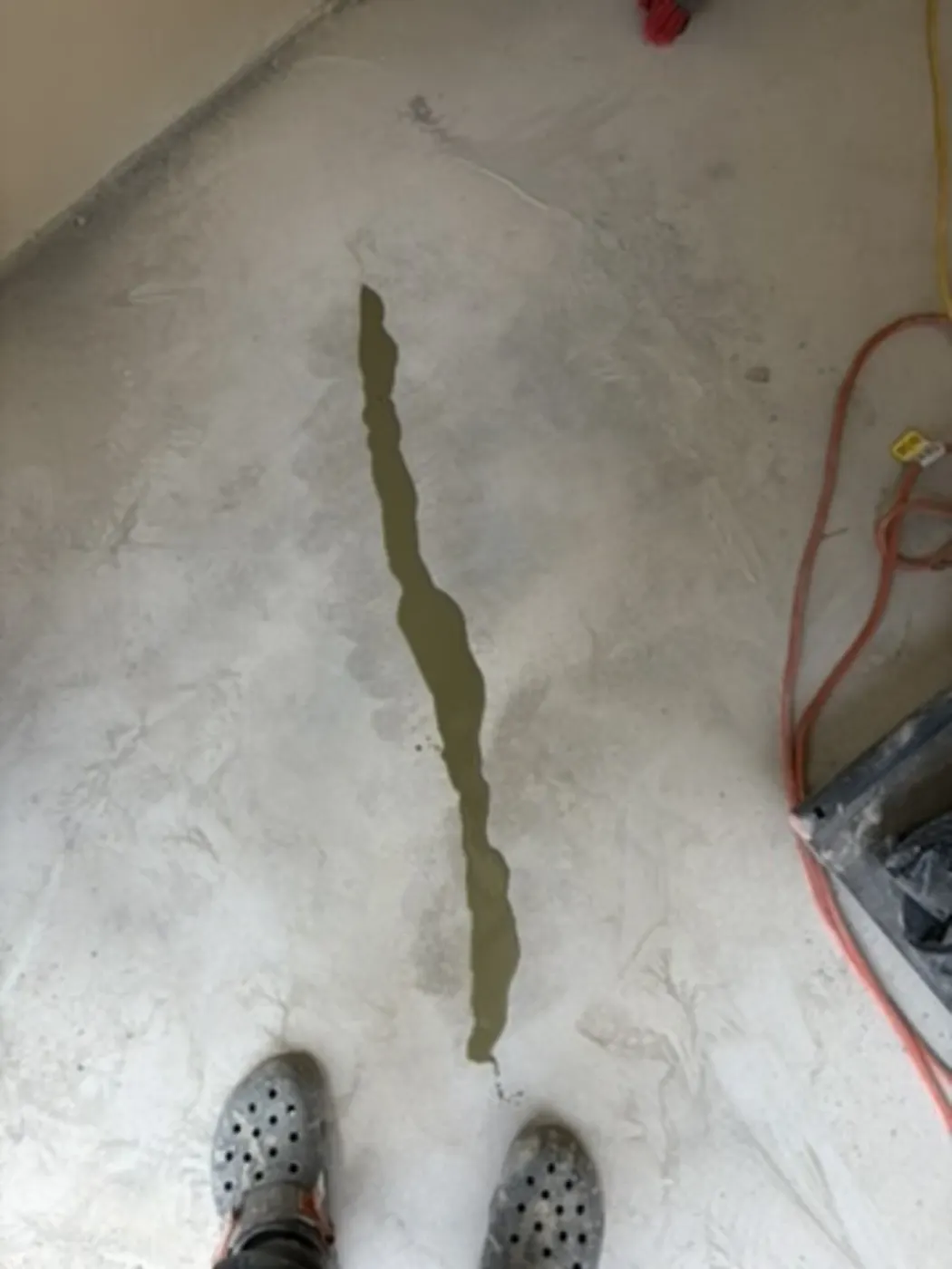 Concrete crack filled and repaired before epoxy coating